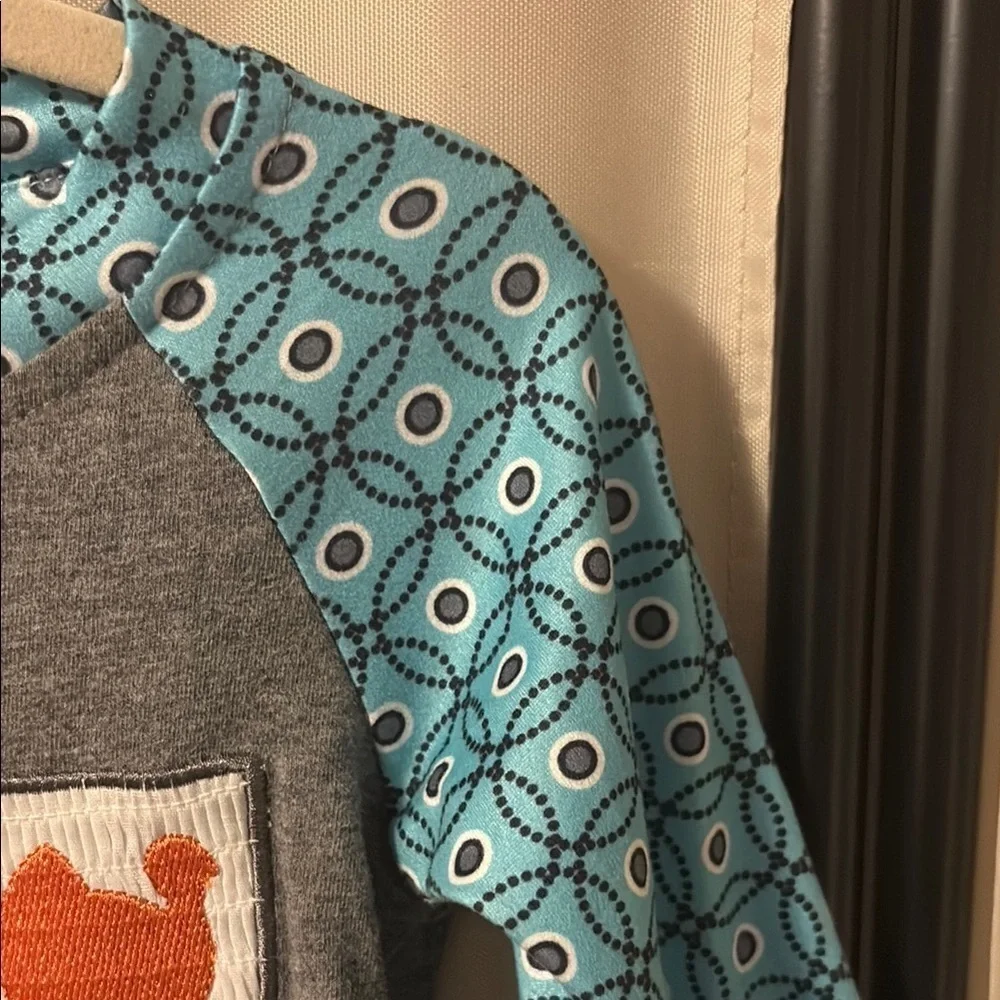Marie Nicole Gray Romper with Blue Patterned Sleeves
